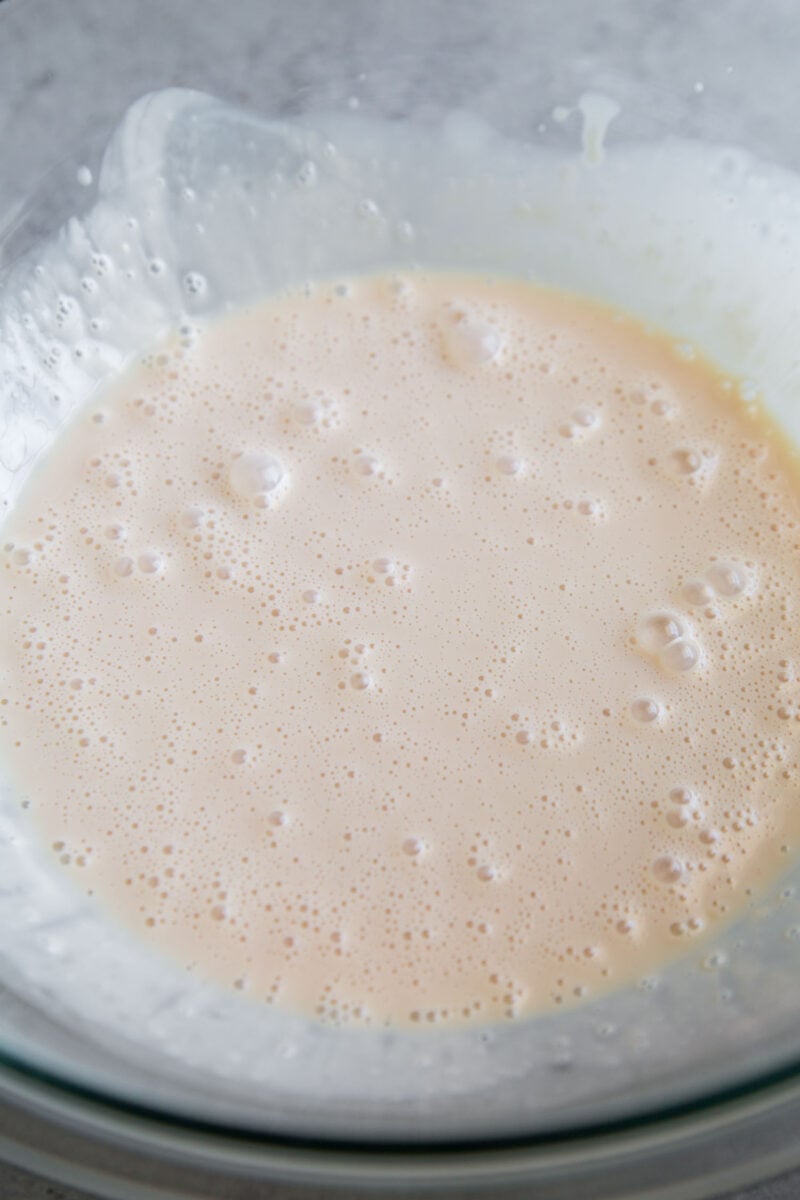 mixture of table cream, sweetened condensed milk, and vanilla extract in a large bowl.