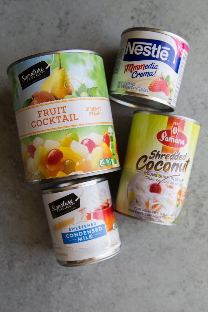 overhead shot of canned ingredients needed to make filipino fruit salad.