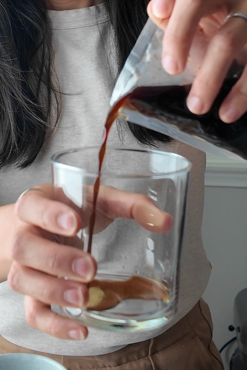 pour brown sugar syrup into serving glass.
