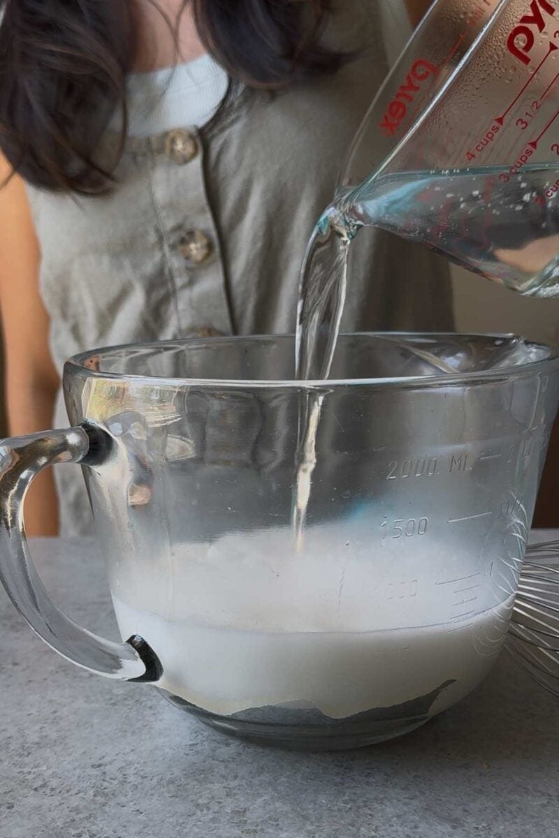 pour hot water over almond jelly powder mix.