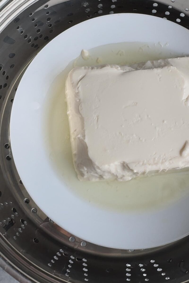 steamed silken tofu on plate.
