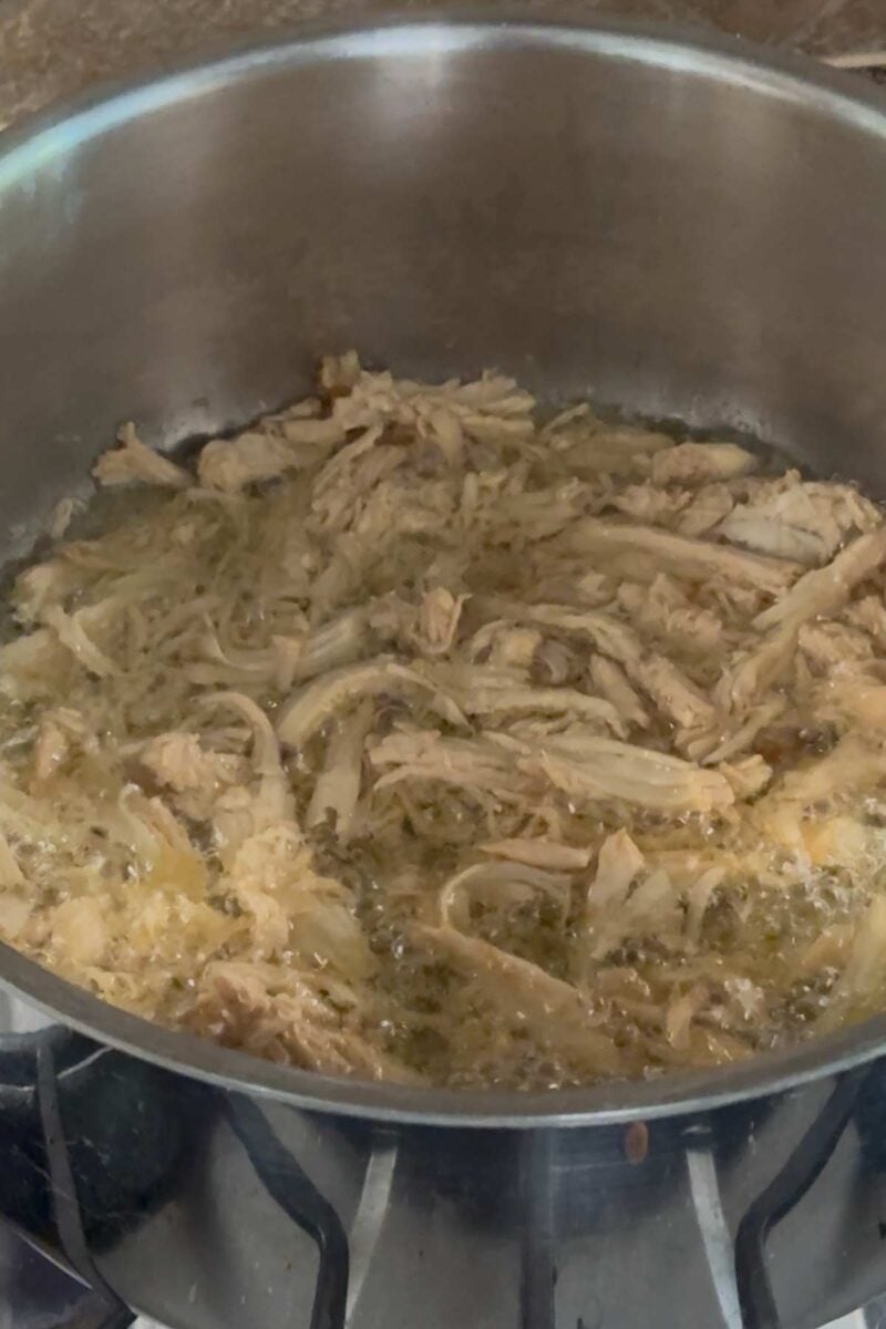 fry marinated chicken in oil.