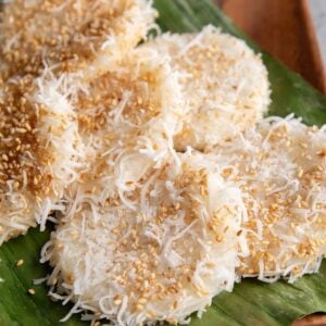 shredded coconut palitaw rice cake on banana leaf.